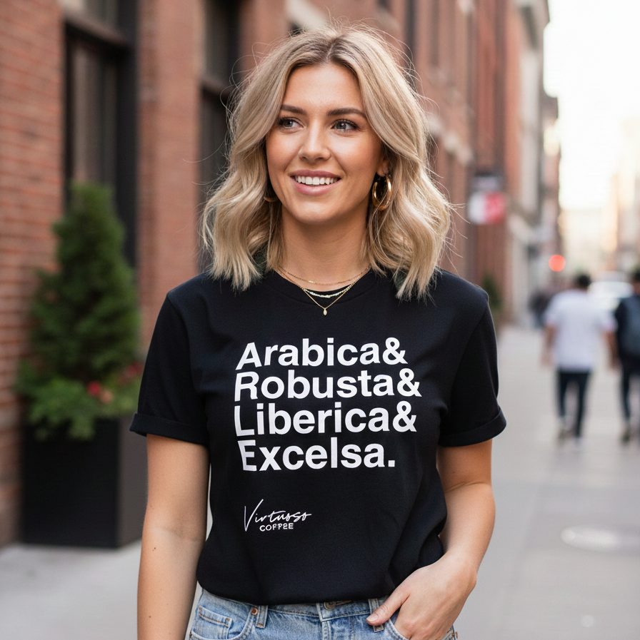 Woman wearing a black t-shirt with coffee bean names on a city street.